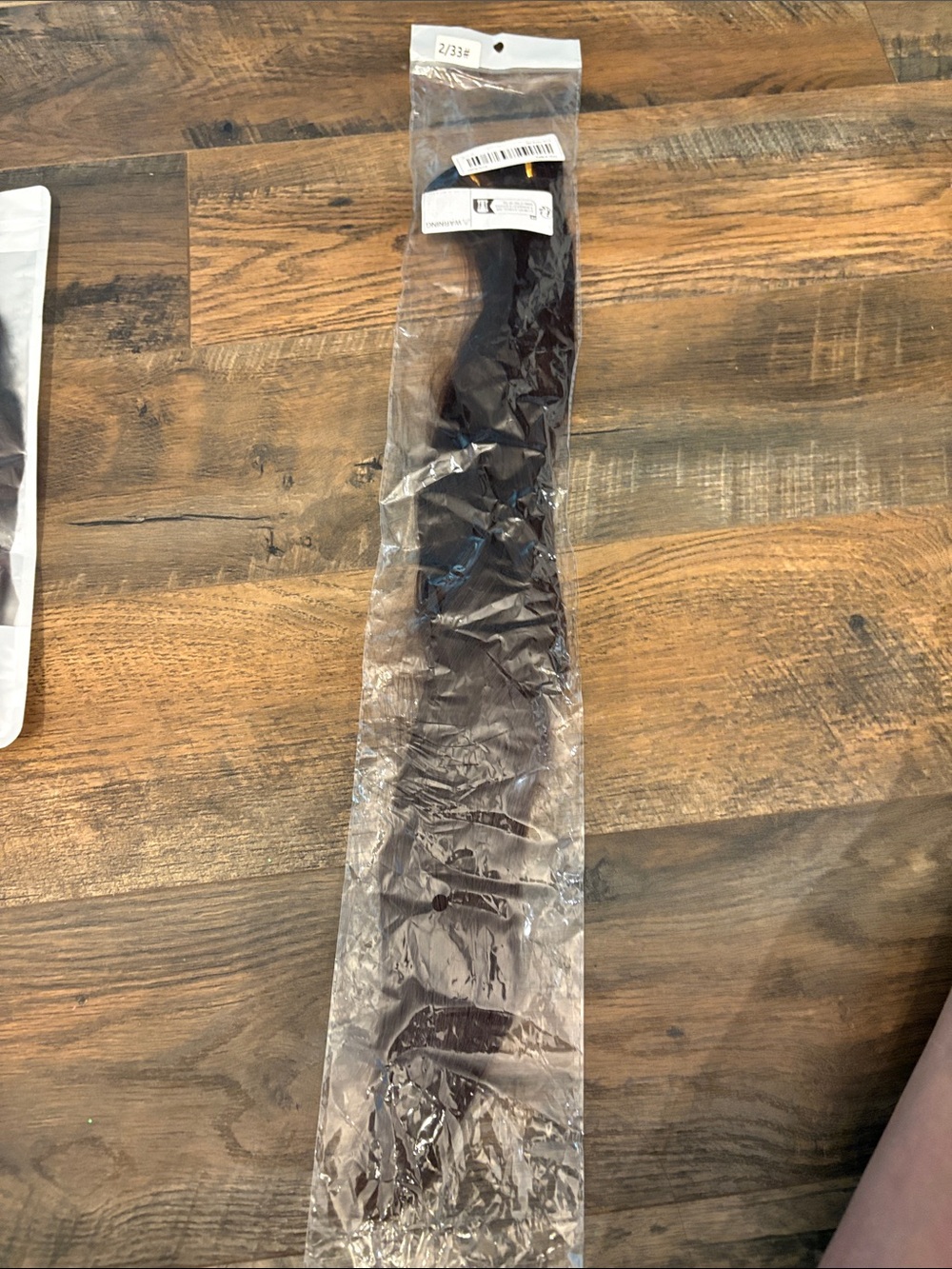 Chocolate Brown Long Hair Extension in Protective Sleeve. Clip in